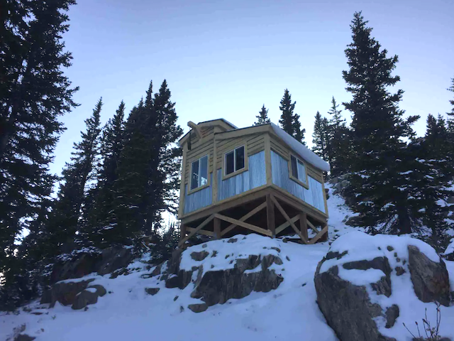 small cabin in the mountains