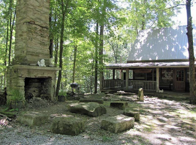 Cabin exterior with fireplace ruins 